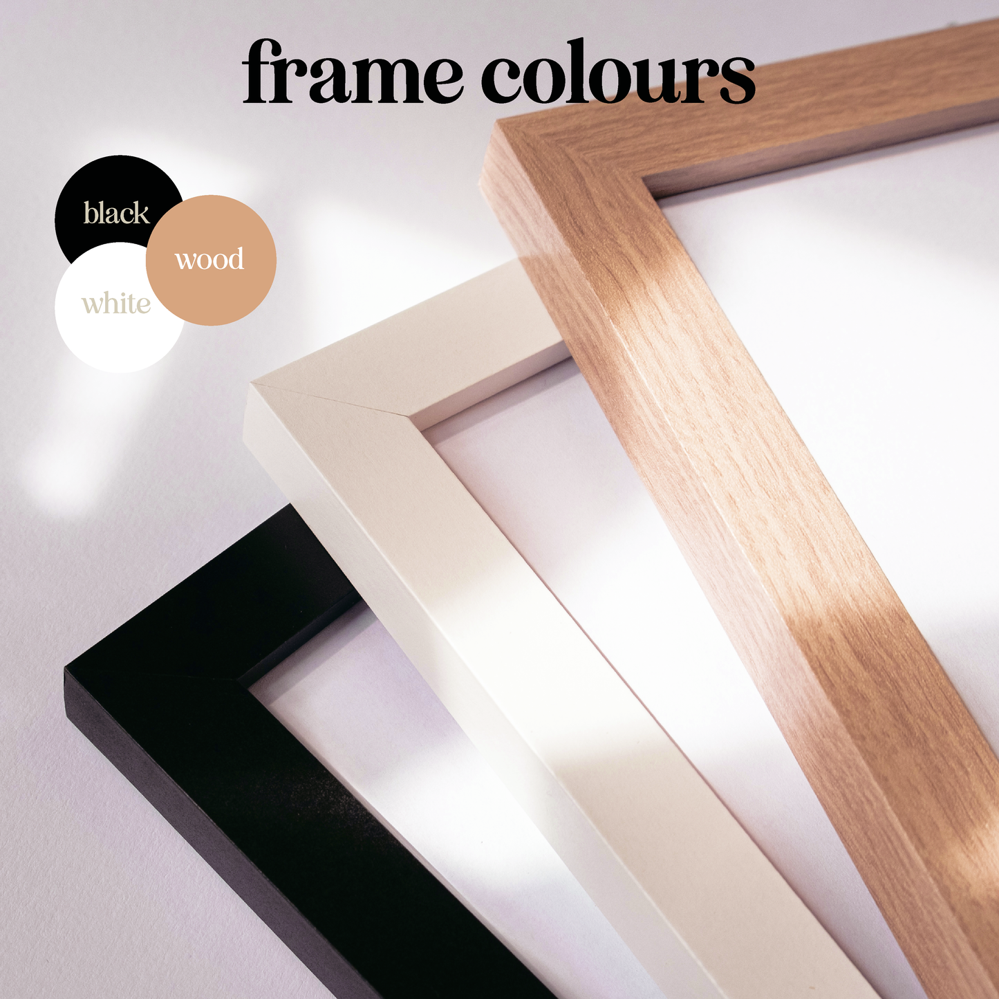 Photo showing the 3 frame colours available to order. Black, white and wood effect.
